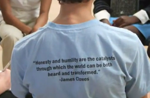 HFB student t-shirt with quote from James Clowes: Honesty and humility are the catalysts through which the world can be both heard and transformed.